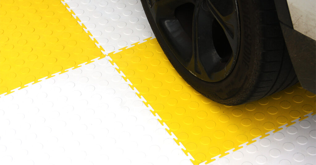 garage flooring yellow and white with car in them