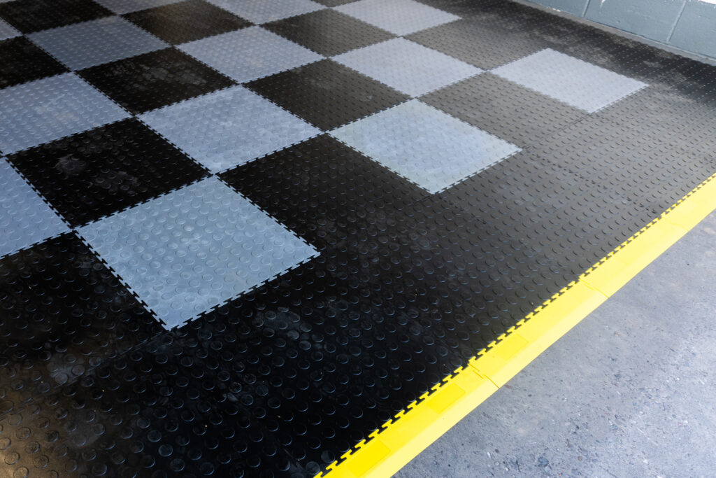 Interlocking floor tiles